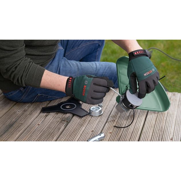 Bosch Тример садовий AFS 23-37, 1000Вт, ліска 37см, ніж 23см, 5.7кг, фото , изображение 10 | SNABZHENIE.com.ua Bosch Тример садовий AFS 23-37, 1000Вт, ліска 37см, ніж 23см, 5.7кг, фото , изображение 10 | SNABZHENIE.com.ua