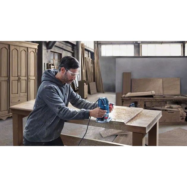 Bosch Фрезер GOF 130, 1300Вт, цанга 6 та 8мм, 11000-28000об•хв, 3.5кг, фото , изображение 3 | SNABZHENIE.com.ua Bosch Фрезер GOF 130, 1300Вт, цанга 6 та 8мм, 11000-28000об•хв, 3.5кг, фото , изображение 3 | SNABZHENIE.com.ua